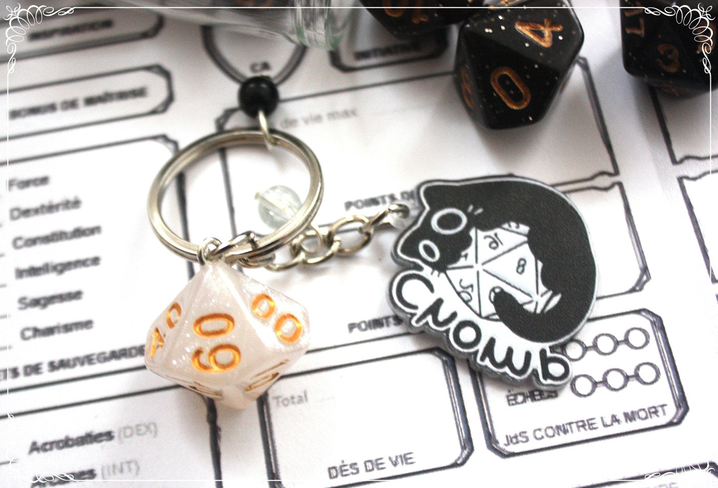 Porte-clés chats et dés jeux de rôle